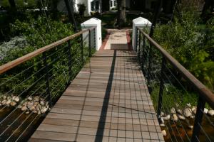 Beautiful draw bridge built over water feature Beautiful draw bridge built over water feature